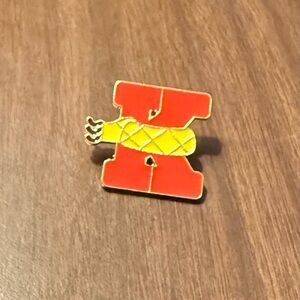 Women’s Accessories Red Letter K with Yellow Scarf Enamel Pin with Brown Accents